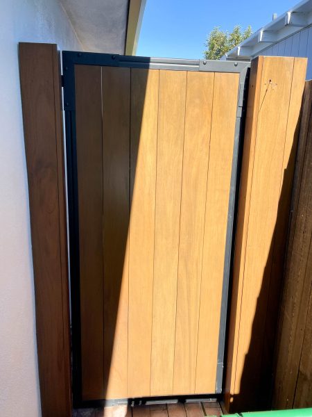 Wood-Fencing-with-Metal-Trim