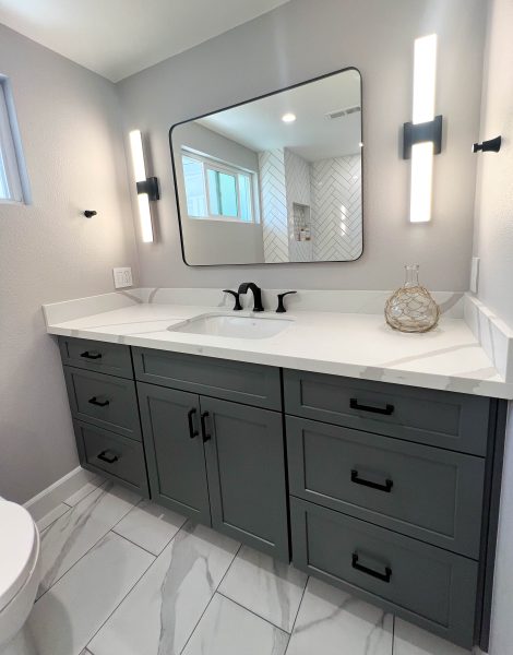 Dark-Grey-Vanity-with-marble-Look-tile-flooring