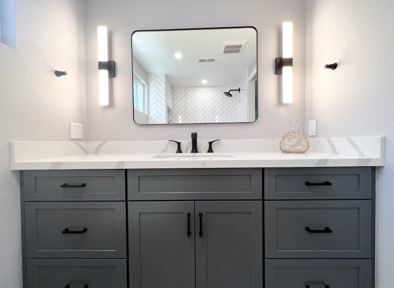 Guest-bathroom-vanity-with-black-accessories