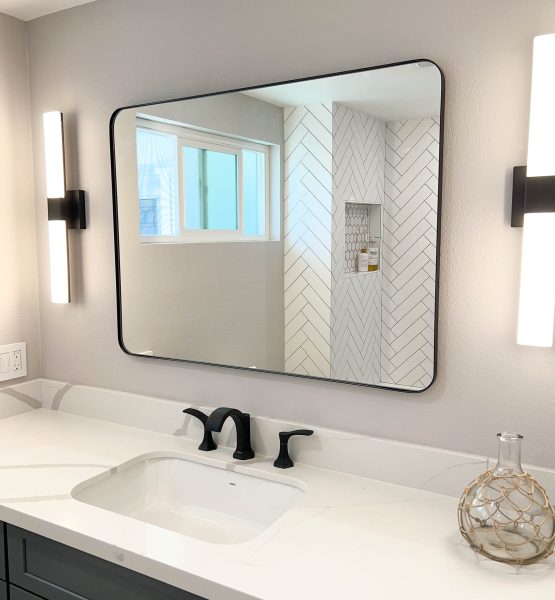 Matte-Black-bathroom-Accessories-with-sconce-lighting