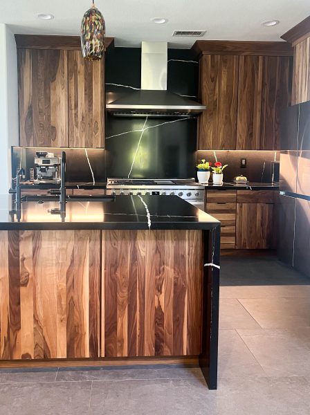 Natural-Walnut-Modern-Kitchen-with-Black-Countertops