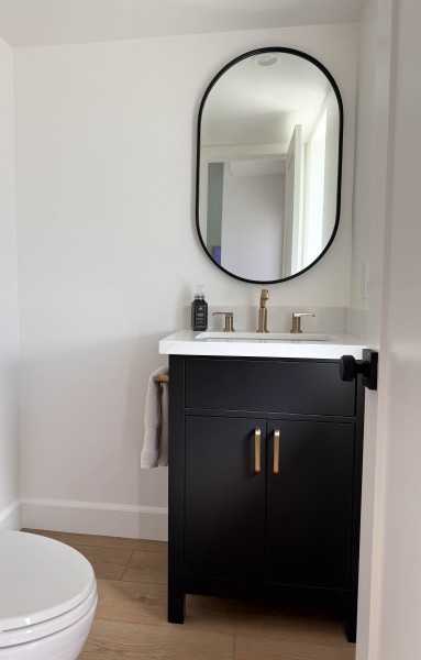 Powder-Bathroom-with-Matte-Black-Vanity