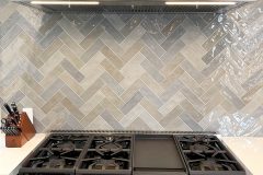 Grey-herringbone-backsplash