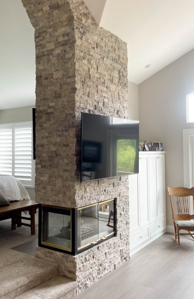 Floor-to-ceiling-stacked-stone-fireplace