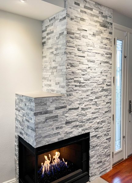 Natural-stacked-stone-fireplace