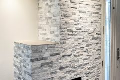 Natural-stacked-stone-fireplace