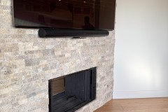 Stacked-Stone-Fireplace-in-Beige-Tones