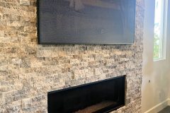 Stacked-Stone-Fireplace-with-Smart-TV