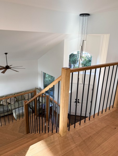 Engineered-Hardwood-Staircase-with-Black-Balusters