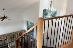 Engineered-Hardwood-Staircase-with-Black-Balusters