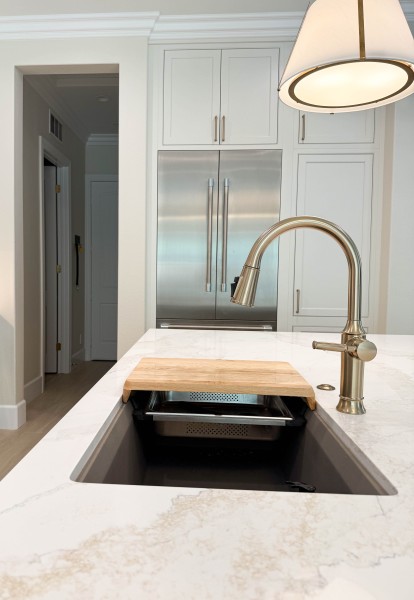 Inset-Cabinetry-with-Gold-Fixtures