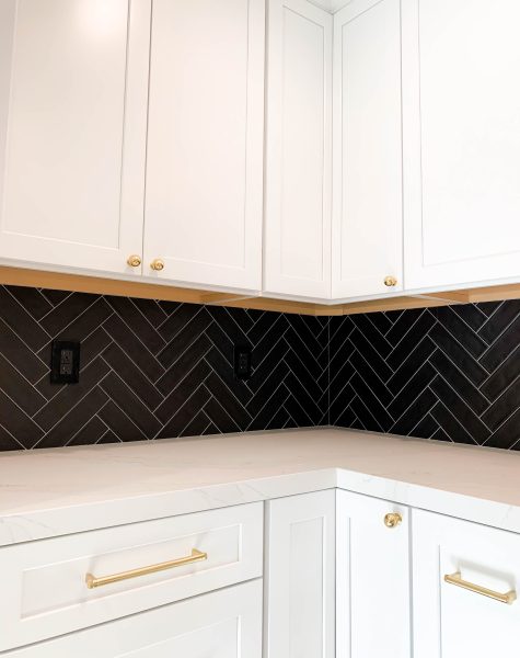 White-Shaker-Cabinetry-with-gold-Handles