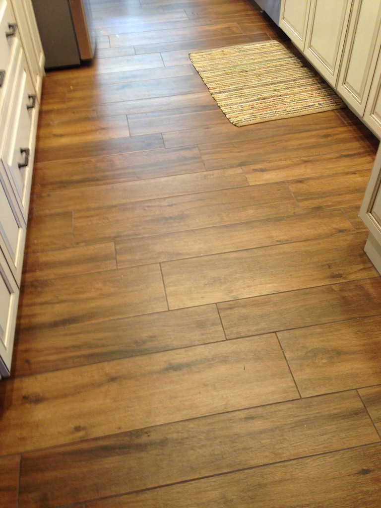 Orange County flooring contractor installs wood look tile in kitchens for tile durability and warmth of wood