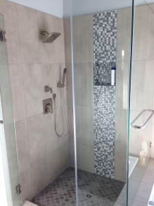 finished shower remodelingproject showing a corner shower