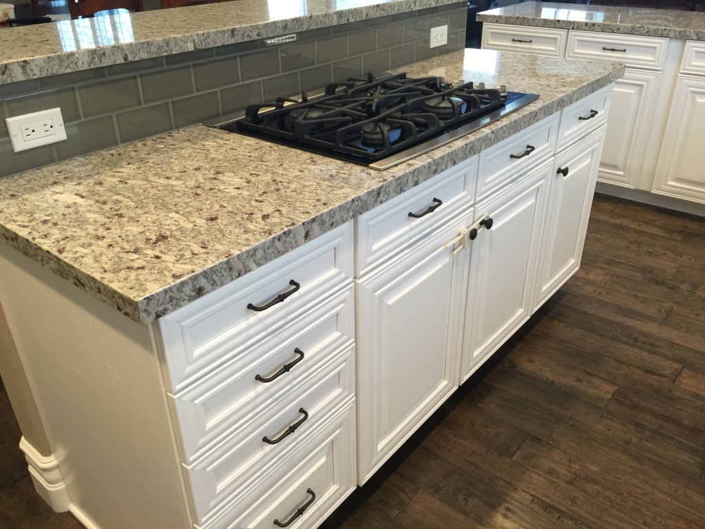 kitchen renovation company installs luxury vinyl to look liek wood