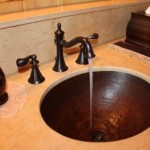 copper sink properly installed by bathroom contractor