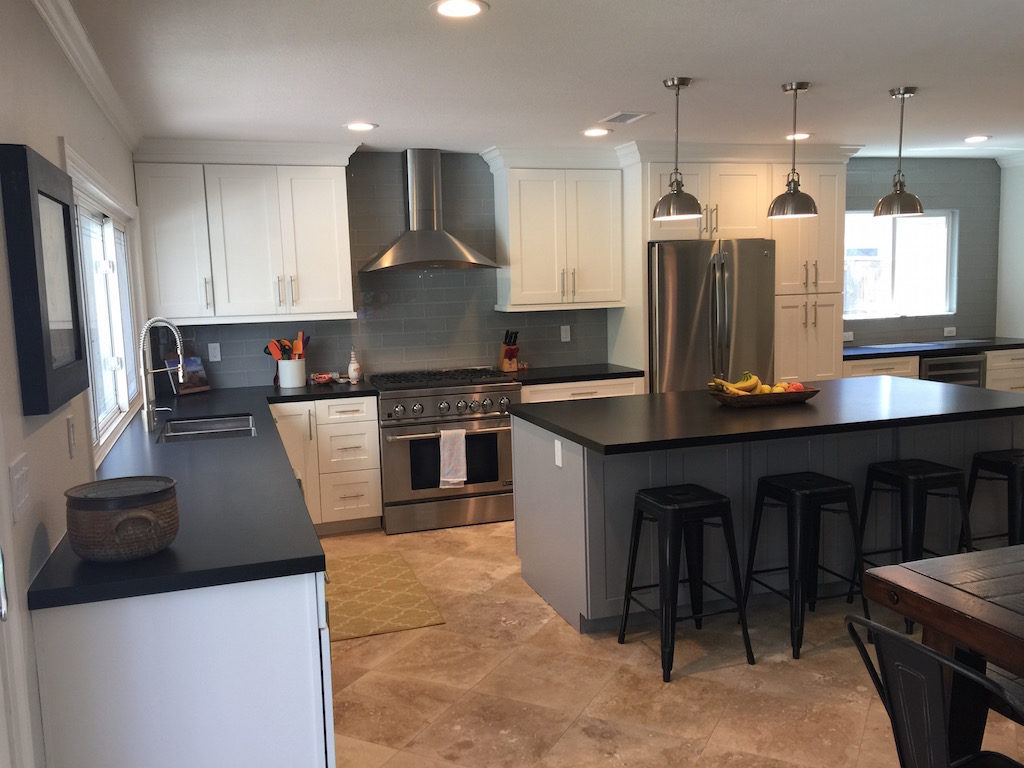 kitchen renovation contractor uses island space to create eat-in kitchen