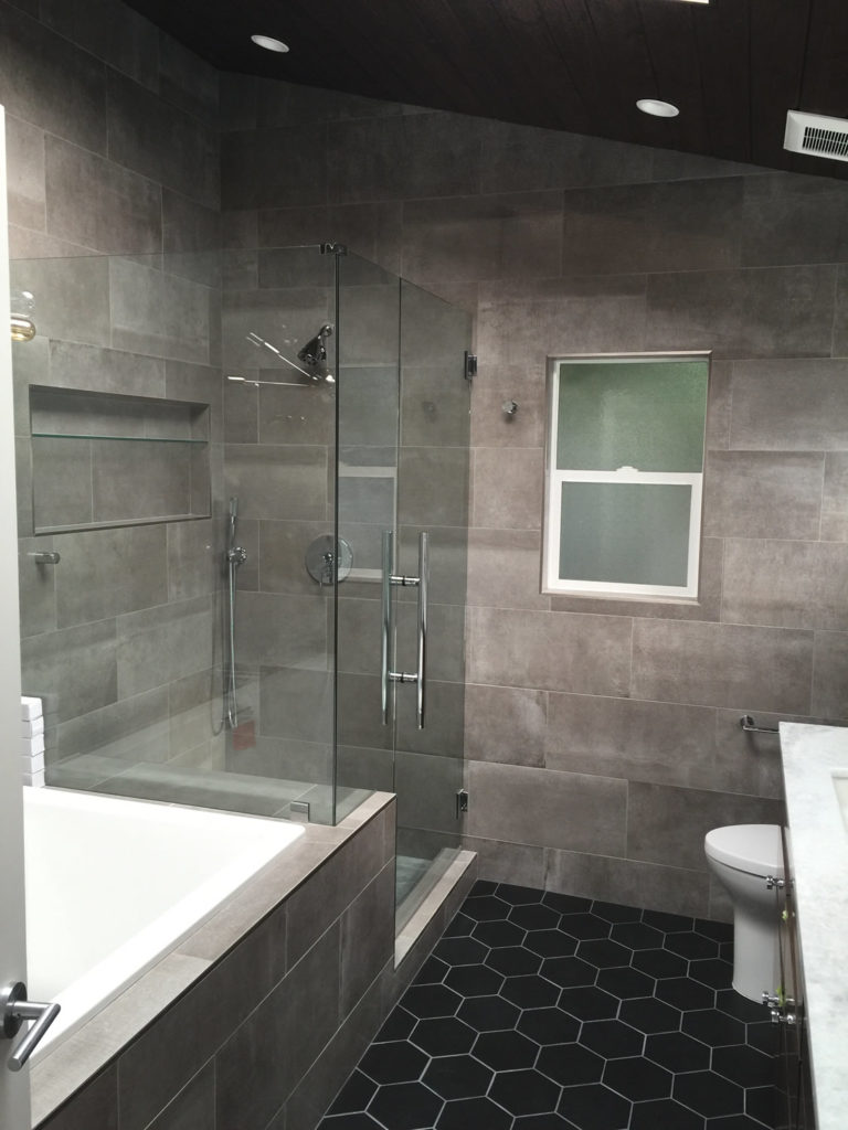 bathroom contractor uses contrasting ceramic tile in Laguna Beach cottage bathroom