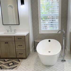 flooring contractor uses herringbone tile patter in San Clemente bathroom
