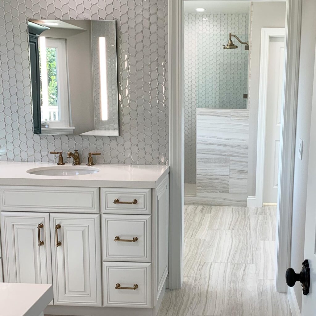Orange County bathroom designers use tile and glass to build a Roman shower in Aliso Viejo bathroom