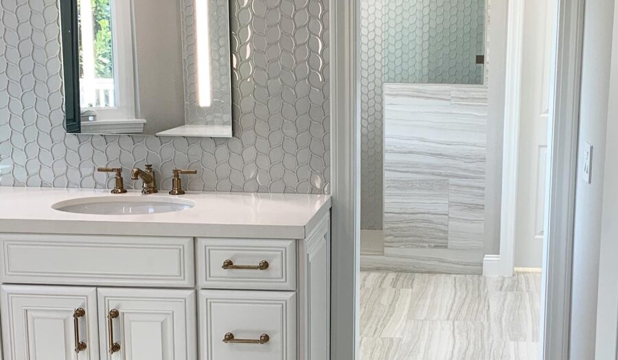 Orange County bathroom designers use tile and glass to build a Roman shower in Aliso Viejo bathroom