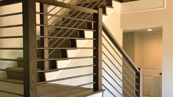 Staircase with updated railings and metal ballusters
