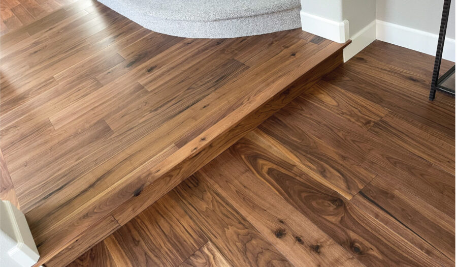 Orange County flooring contractor after photo engineered walnut hardwood flooring in hallway