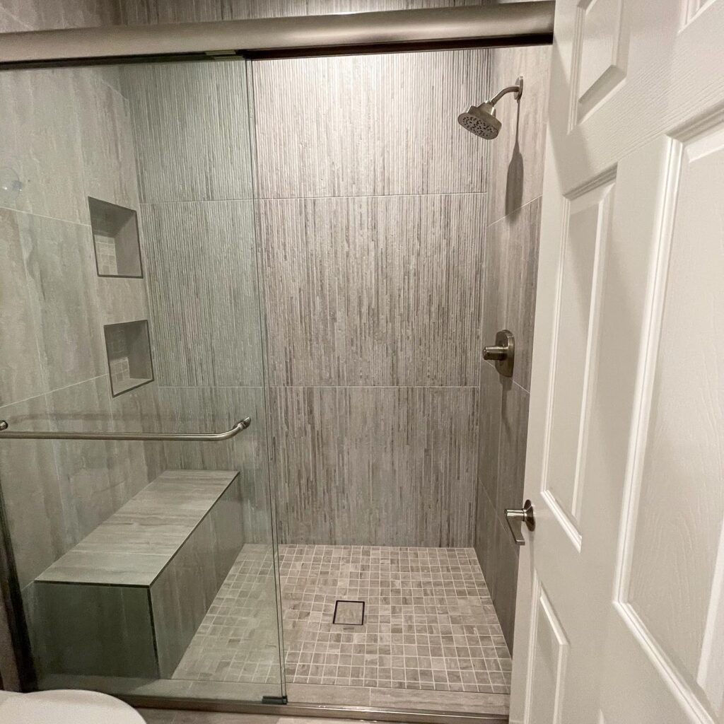 linen tile creates accent wall in Irvine bathroom design