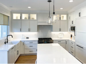 Clean white kitchen with black details