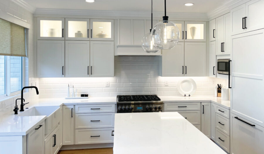 Clean white kitchen with black details