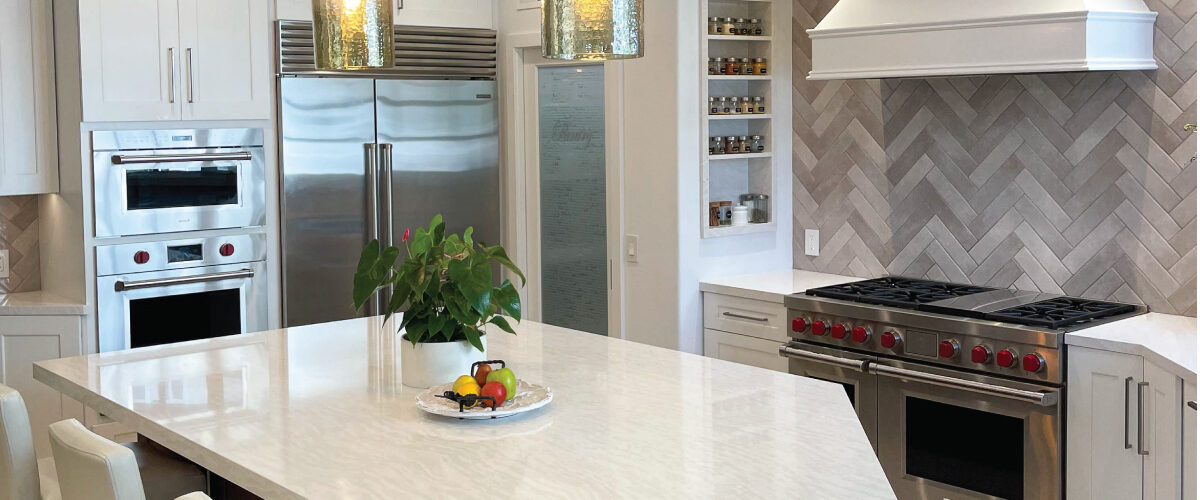 Spacious Kitchen Design with Grey Herringbone Backsplash