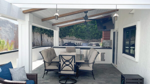 general contractor after BBQ and patio cover with wood look beams