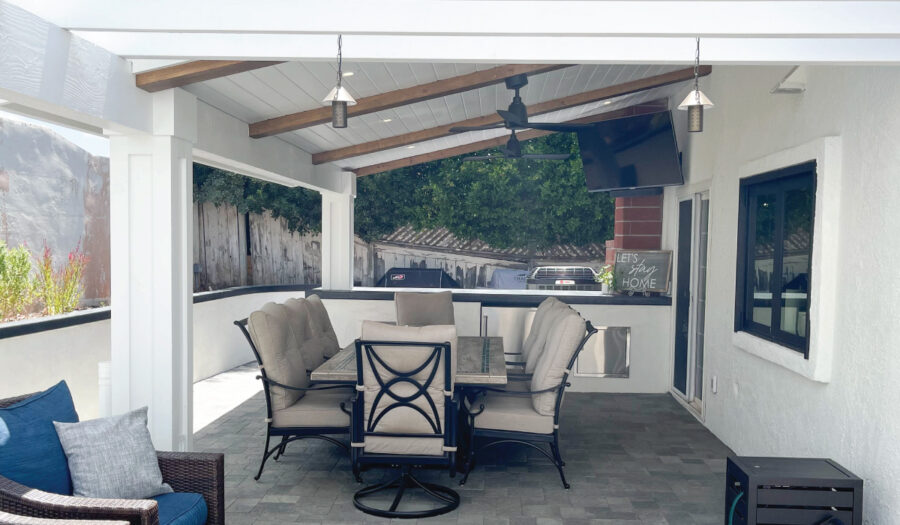 general contractor after BBQ and patio cover with wood look beams