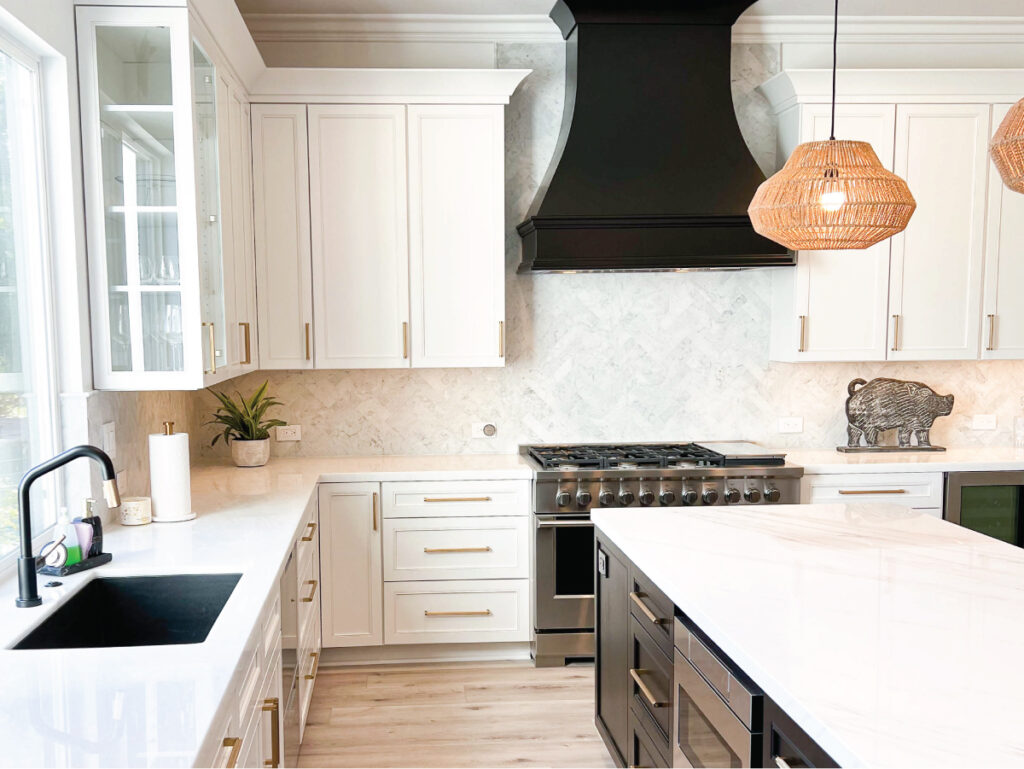 Marble kitchen countertops with black and white cabinetry