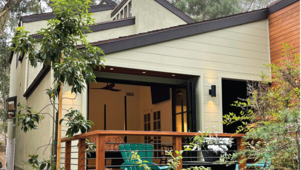 Modern mahogany exterior siding with black roofing