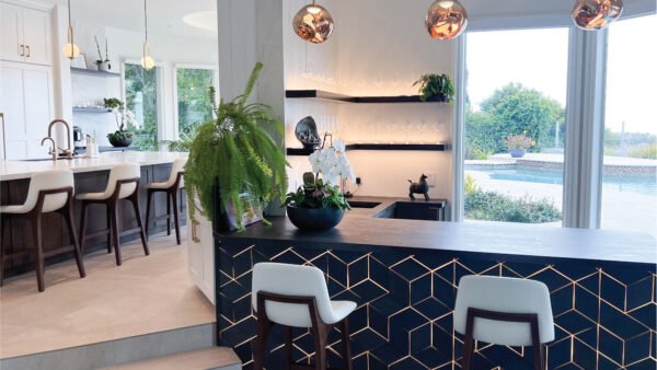 Soft-modern whole home renovation with wood-tone and white cabinets