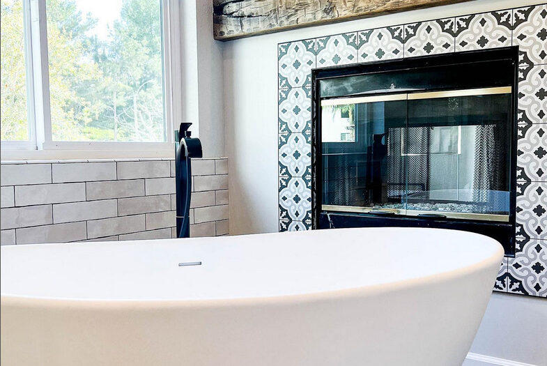 bathroom renovation company adds fireplace to san clemente bathroom