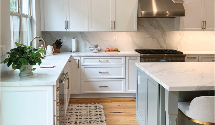 kitchen renovation with white cabinets and eat in island