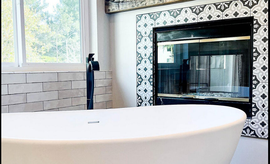 Orange county general contractor adds fireplace to San Clemente bathroom remodeling to match black and white theme