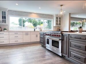 custom kitchen remodeling after picture white and brown cabinets stainless steel appliances La Cabana windows