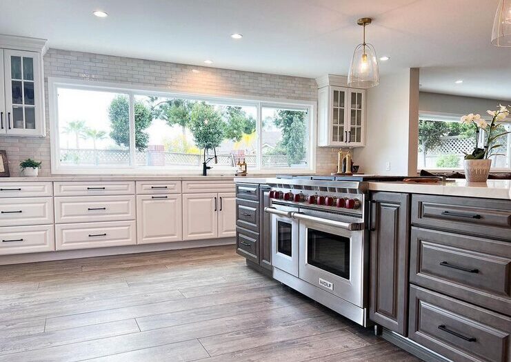 custom kitchen remodeling after picture white and brown cabinets stainless steel appliances La Cabana windows