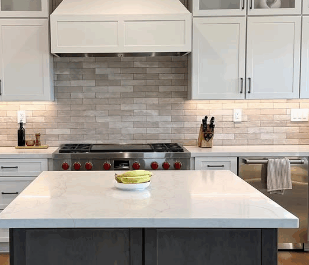 custom kitchen remodeling after white custom range hood installed to match white cabinets
