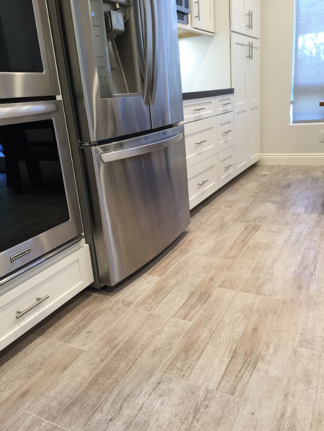 kitchen after orange county flooring contractor installs ash wood-look tiles