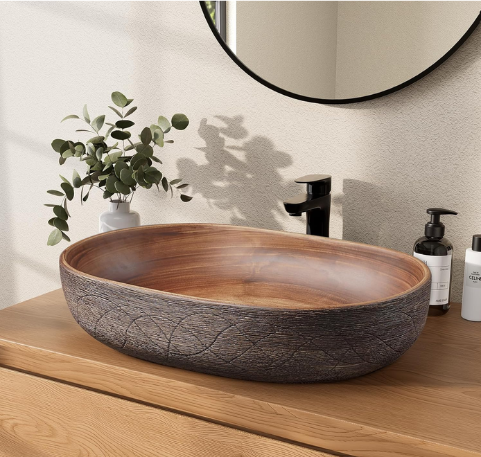 vessel sink on a wood counter