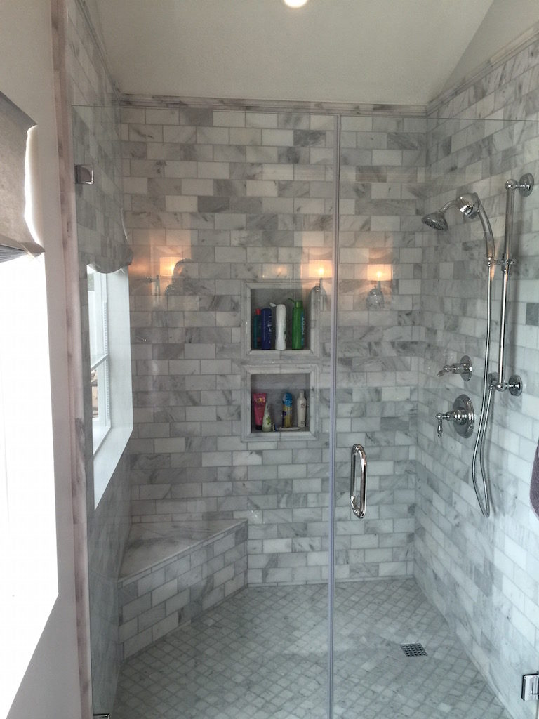 Shower remodeling adds two niches to wall opposite shower head