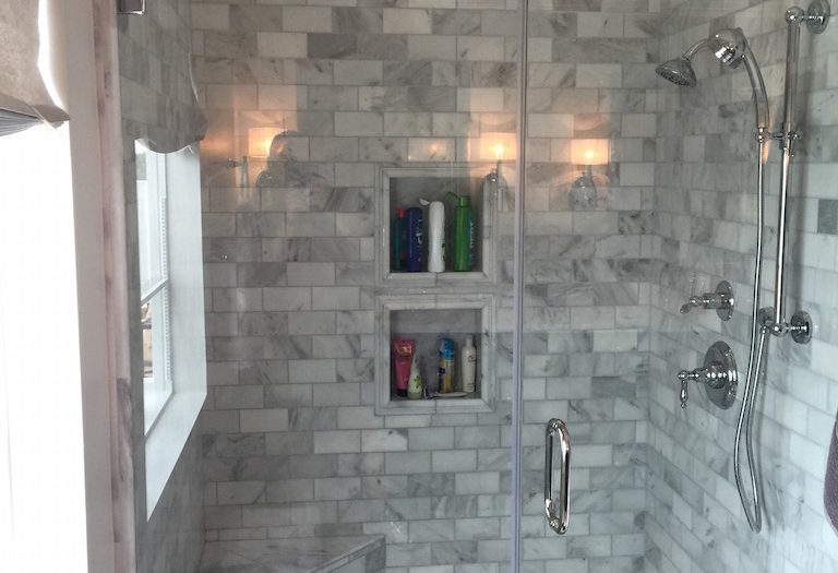 Shower remodel adds two niches to wall opposite shower head